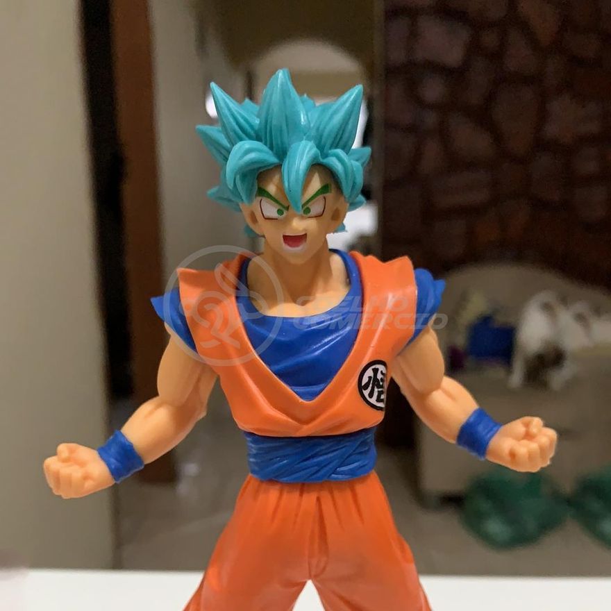 Figura Goku Super Sayajin Dragon Ball Z 16 cm - Universo Ucomics  Colecionáveis